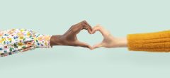 Heart hands gesture in diversity concept