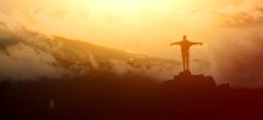 Tourism in mountains. Tourists on the top of the mountain. Nature in mountains at autumn.